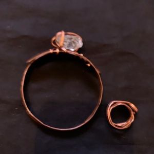 A bundle of a copper ring and bracelet